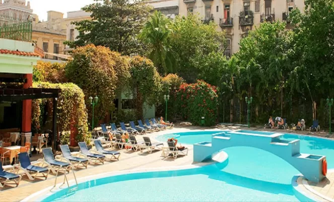 Relax by the pool of the Hotel Sevilla