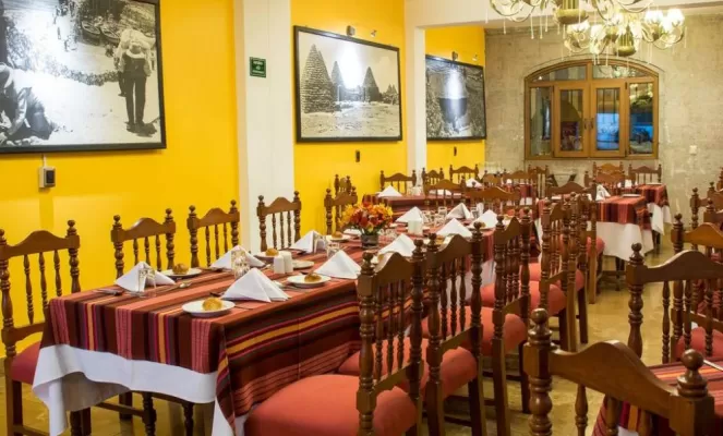 Enjoy a Peruvian meal at the restaurant of the Hotel Hacienda Plaza de Armas
