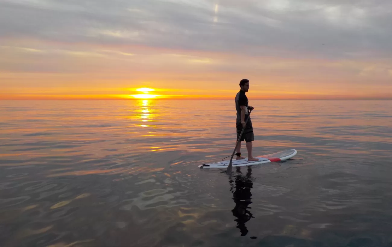 Man Stand Up Paddle Boarding