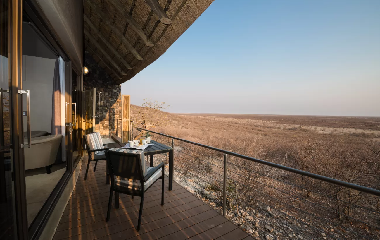 Spend your mornings with a coffee in hand overlooking Etosha National Park