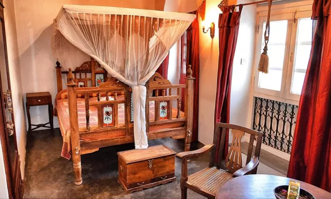Settle into your Arabic-style bedroom at Zanzibar Coffee House