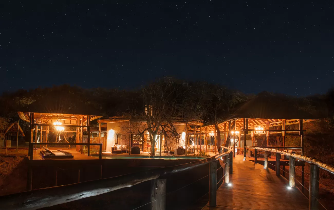 Moditlo Lodge's walkways lit up at night