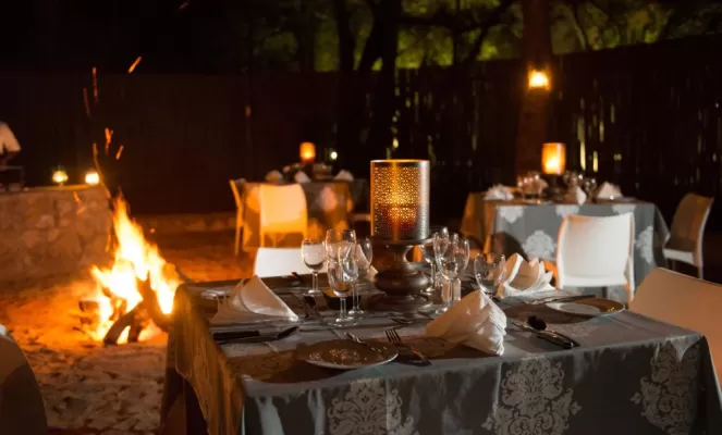 Enjoy a Boma dinner at Moditlo Lodge