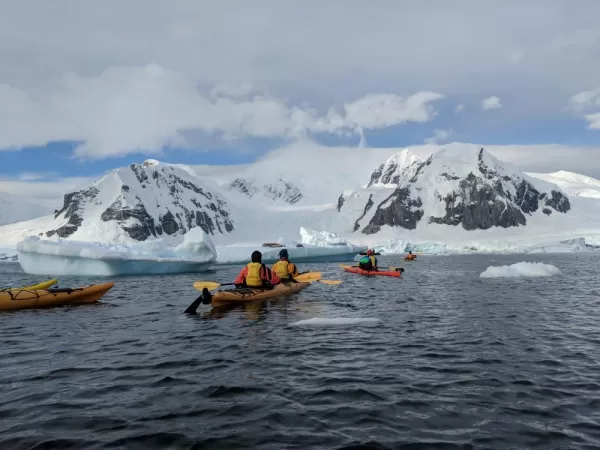 Kayaking through Antarctic waters.