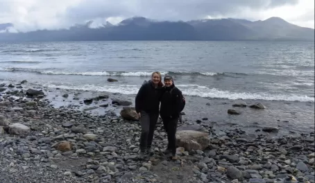Karen and Meg on the shore of Lago Fagnano