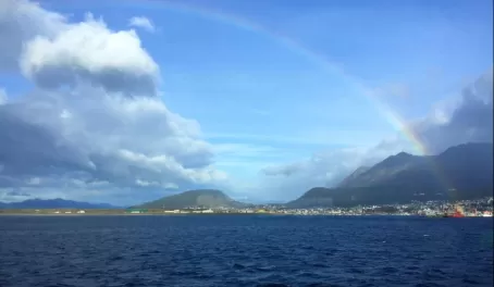 A rainbow appears over Ushuaia as we wait for the winds to die down so that we can dock the ship safely