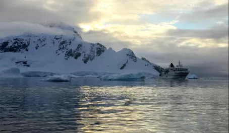 The RCGS Resolute rests in Antarctic waters