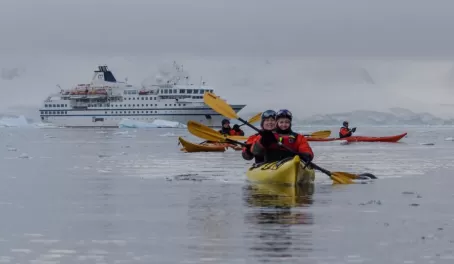 Karen and Meg paddling Antarctic waters