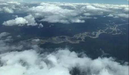 A view of the Demerara River between a break in the clouds