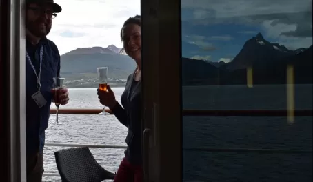 Toasting our journey on our private balcony on the Hebridean Sky
