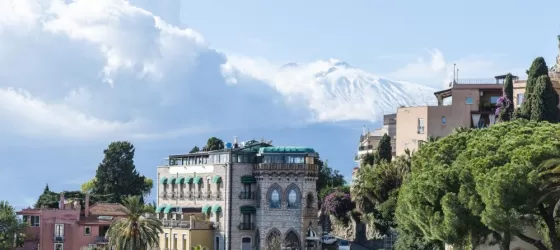 Beautiful Taormina, Italy, with Mt. Etna in the background