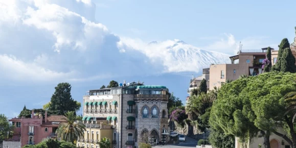 Beautiful Taormina, Italy, with Mt. Etna in the background