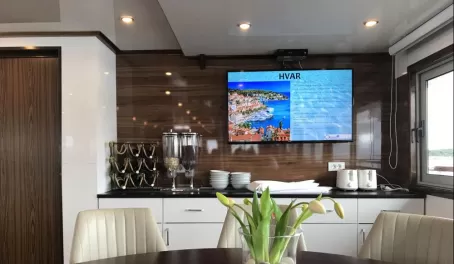 On the TV you will find information about your next destination, and below is the salad and breakfast bar