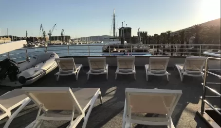 Chairs in a row on the Mama Marija's sun deck