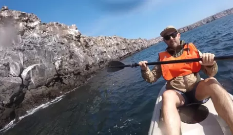 Kayaking around cliffs