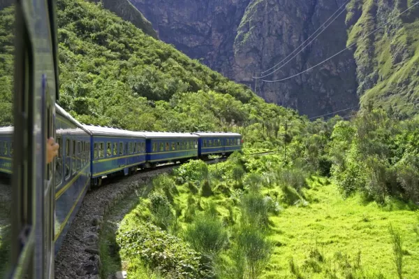 Enjoy a scenic train ride through the mountains of Peru