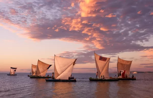 small ships sailing in indian ocean