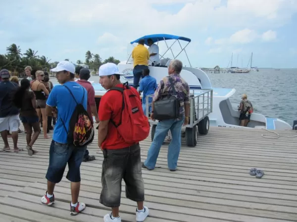 Arrived at Caye Caulker! - Waiting for our bags