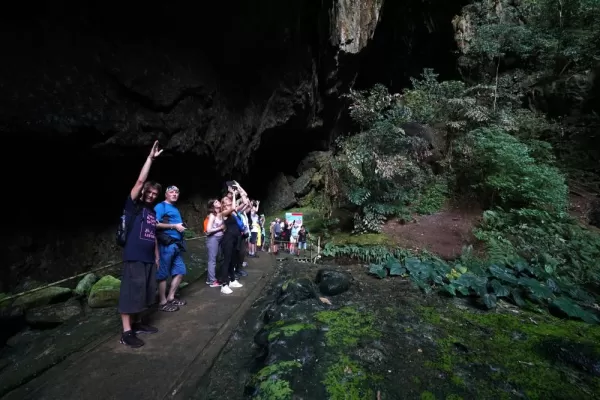 Tourists on walkway at the Deer Cave, Gunung Mulu National Park