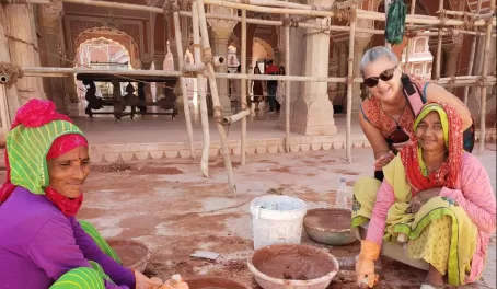 Watching these ladies make the sandstone to do repairs.