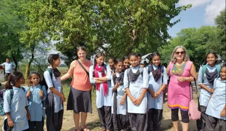 Some school girls wanted pictures with us. In rural areas, they don't see many like us.