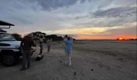 Stopping for a Sundowner (usually a G&T) at sunset in Hwange National Park