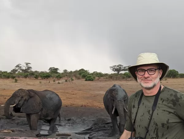 I stopped for a photo at the watering hole (in the rain) near Jozibanini Camp before descending into the hide.