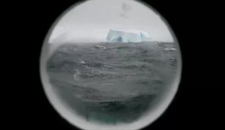 Iceberg out the porthole of our cabin
