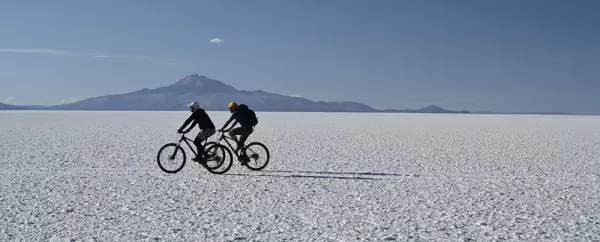 Biking in the largest salt flat in the world, in Uyuni, Bolivia