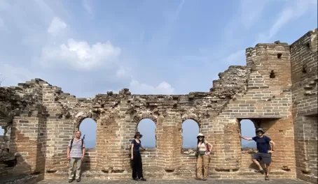 Taking a break to pose on the Great Wall