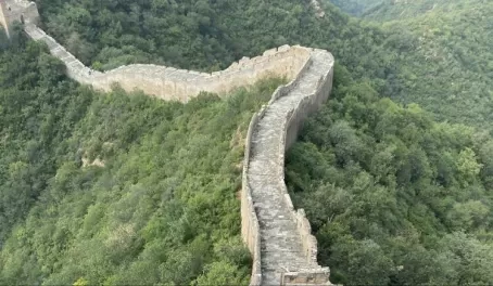 Climbing down a steep section of the Great Wall