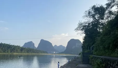 Locals fishing and swimming in the Li River