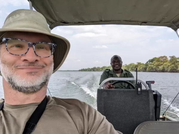Traveling between Lower Zambezi Camps via boat on the Zambezi River