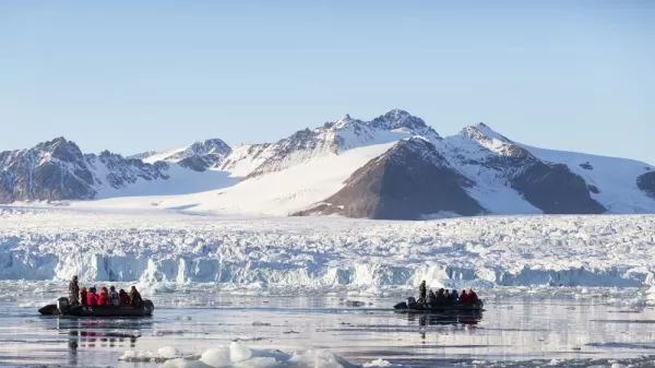 Zodiac cruising near a Greenlandic glacier