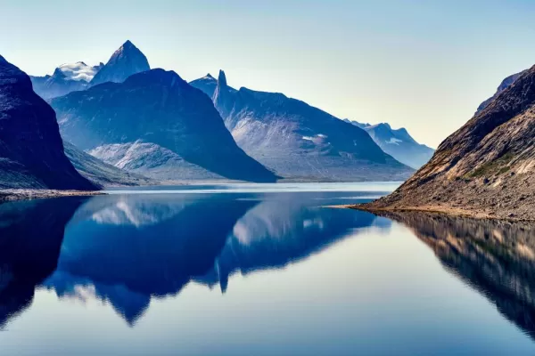 Mountains reflected in the fjord of Tasermiut, Greenland
