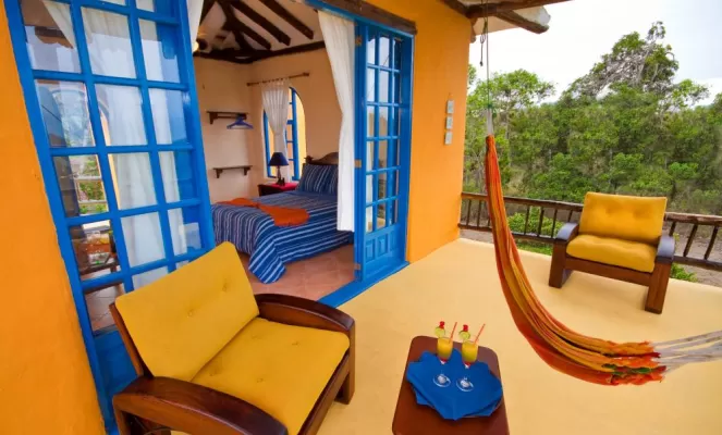 Relax inside or out on your private porch at Mantaraya Lodge