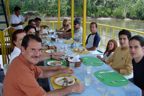 Converse with your fellow Amazon explorers in the open-air dining room of the Manatee