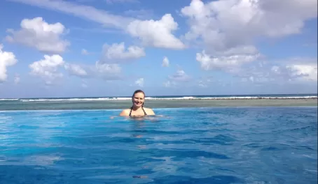 Enjoying a dip in the infinity pool at Turneffe Flats