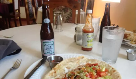 Shrimp fajitas and a cold Belikin for lunch in Placencia