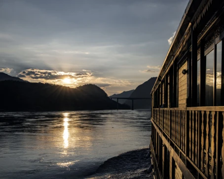 Experience an upper Mekong Laos scenery aboard the Anouvong