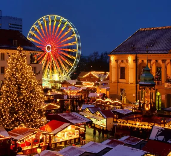 Take a ride on the ferris wheel or take a stroll through the Christmas Market