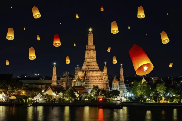 Loy Krathong festival lanterns over Wat Arun in Bangkok