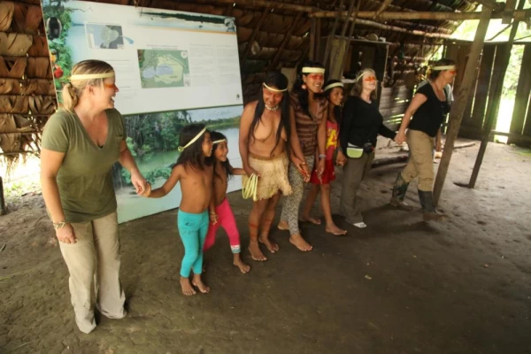 Adventures at Huaorani EcoLodge! Dancing with the Huaorani people.