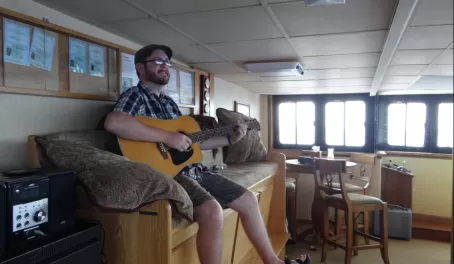 Kepler playing some guitar on board