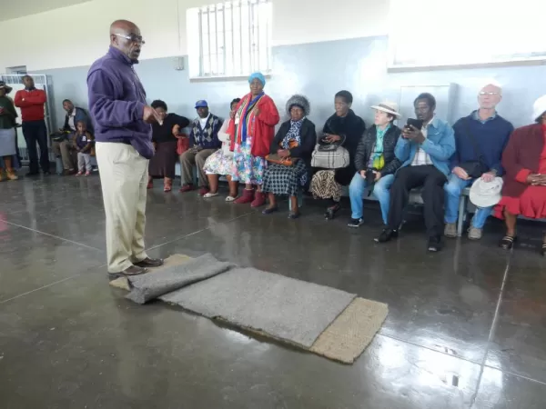 Our guide, a former prisoner of Robben Island describes the harsh conditions