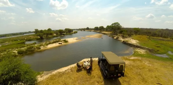 Enjoying a sundowner overlooking the Zambezi River